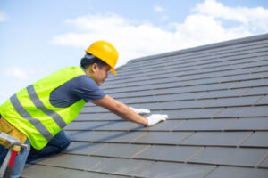 Installer working on roof